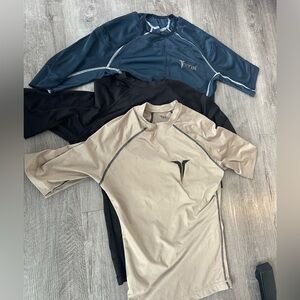 titin 3 shirts, one weighted shirt, two overshirts. size medium. mens.